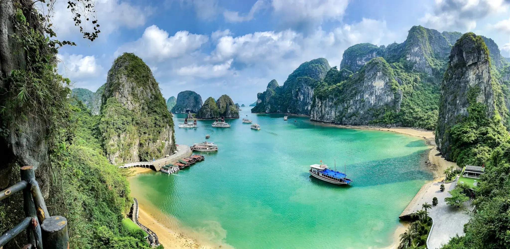 limestone karsts boats in ha long bay vietnam